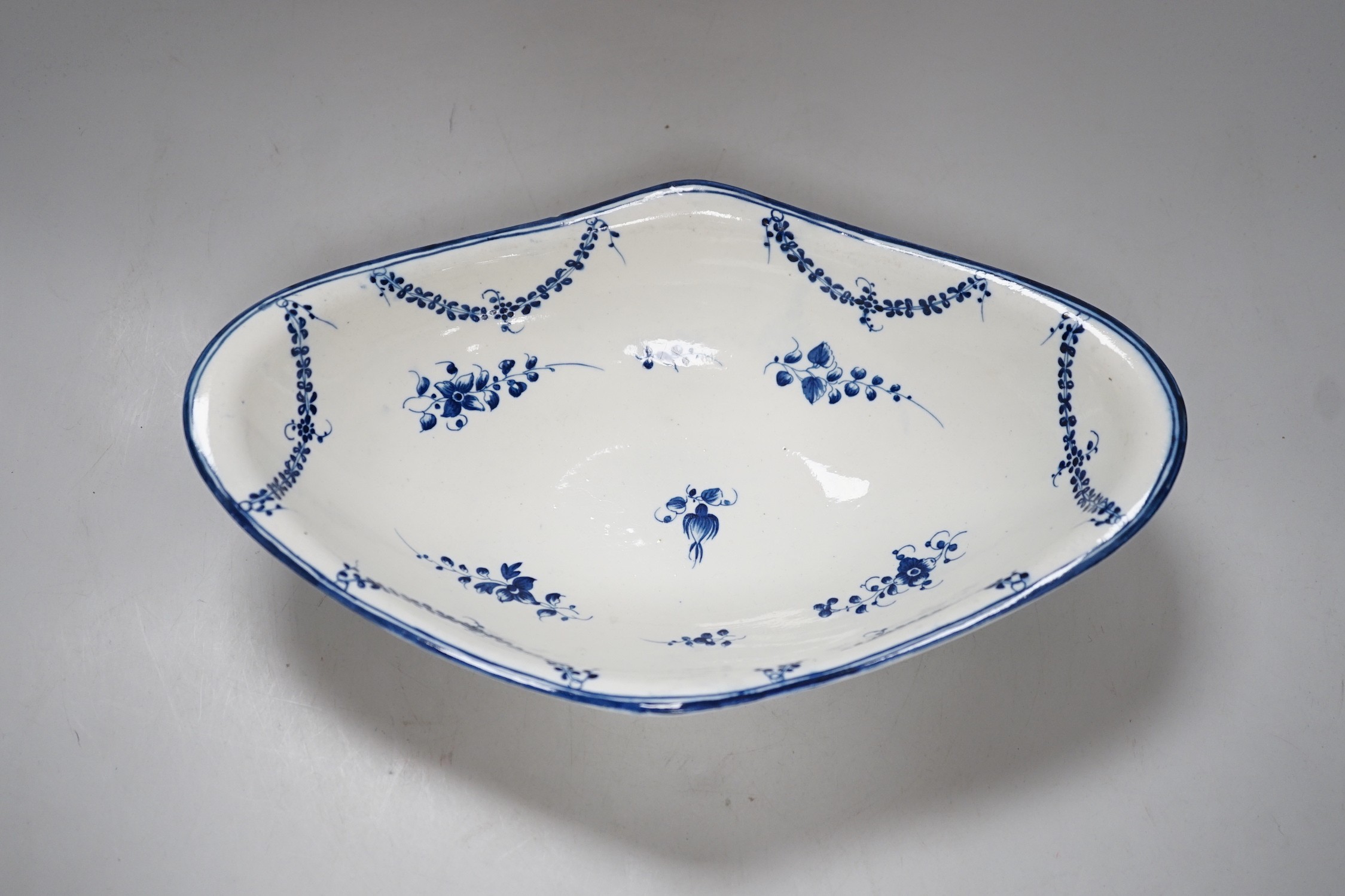 An 18th century Caughley rare Pineapple Dish painted with the Dessert Festoons pattern, 32cms wide